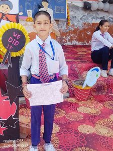 sTUDENT WITH MARKSHEET AT SSN PUBLIC SCHOOL